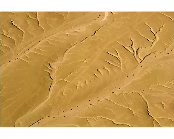 Drainage Patterns on the ancient Namib Plains - aerial view of the desert near Swakopmund - Vehicle tracks clearly scar the fragile plains below - Namib Desert - Namibia - Africa