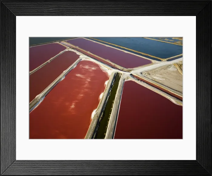 Framed Print : Evaporation ponds for the commercial extraction of sea salt - showing the bright resulting colours - Near Swakopmund - Namib Desert - Atlantic Coast - Namibia - Africa Framed Print : Evaporation ponds for the commercial extraction of sea salt - showing the bright resulting colours - Near Swakopmund - Namib Desert - Atlantic Coast - Namibia - Africa