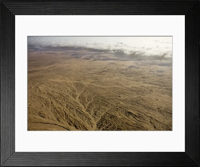 Framed Print : Aerial view of mist rolling in from the cold Atlantic Ocean over the Namib Desert Plains - Namib Desert - Namibia - Africa Framed Print : Aerial view of mist rolling in from the cold Atlantic Ocean over the Namib Desert Plains - Namib Desert - Namibia - Africa