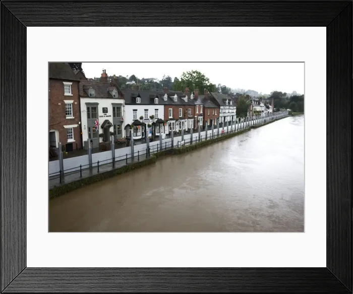 Framed Print : UK - Flood barriers protecting riverside houses along rising River Severn Bewdley Worcestershire Framed Print : UK - Flood barriers protecting riverside houses along rising River Severn Bewdley Worcestershire