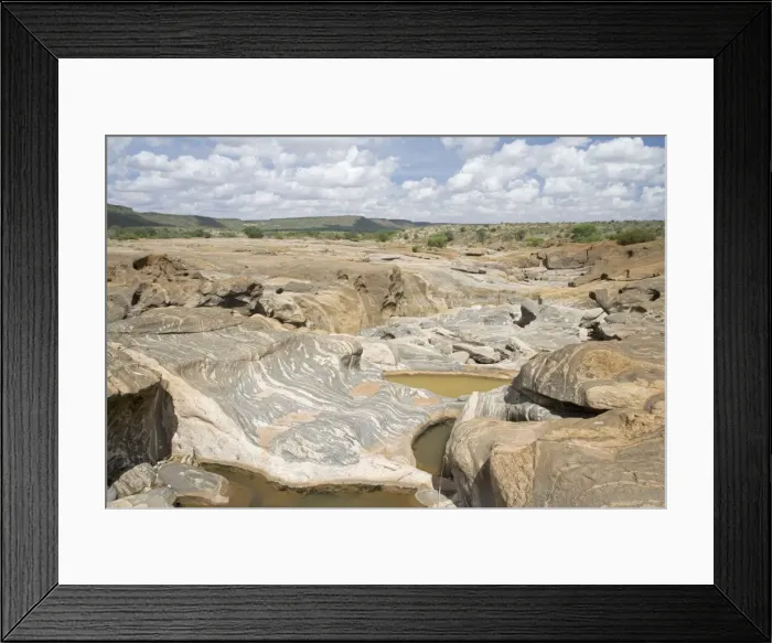 Framed Print : Smooth eroded rocks below Lugard Falls on Galana River Tsavo East National Park Kenya Framed Print : Smooth eroded rocks below Lugard Falls on Galana River Tsavo East National Park Kenya