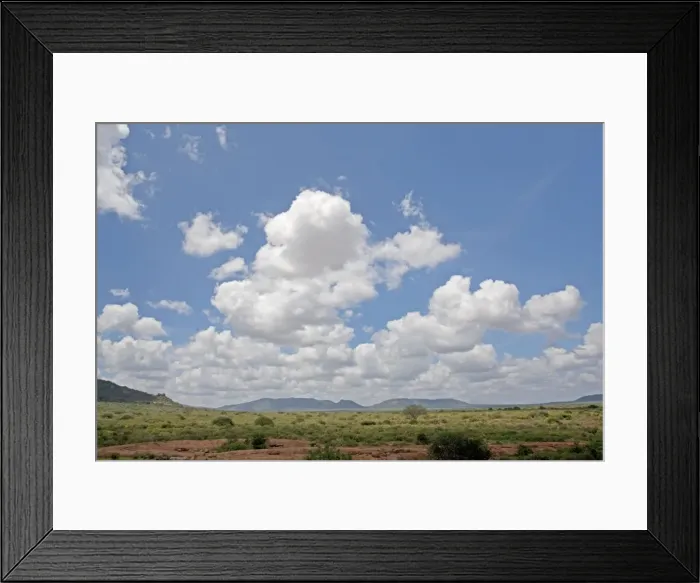 Framed Print : Cumulus cloud formations from Mudunda Rock Tsavo East National Park Kenya