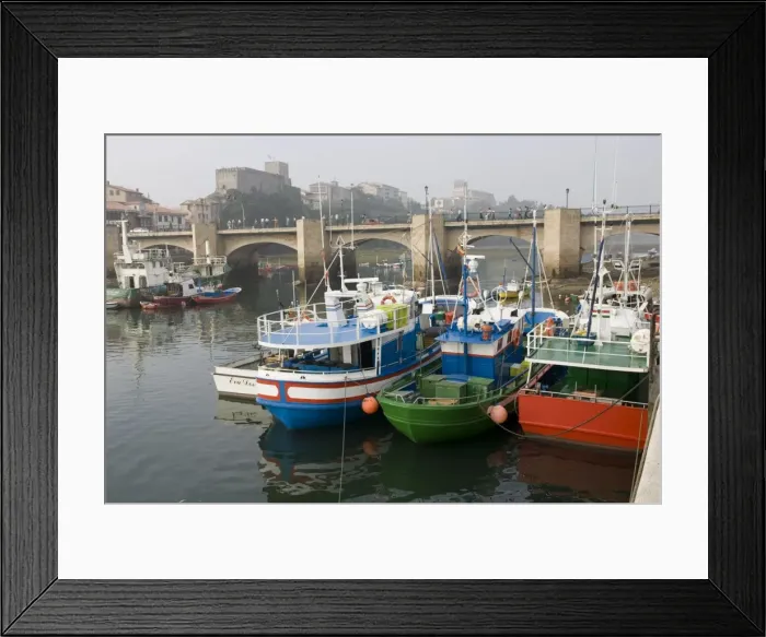 Framed Print : Spanish trawlers moored on quayside near bridge San Vicente de la Barquera Spain Framed Print : Spanish trawlers moored on quayside near bridge San Vicente de la Barquera Spain