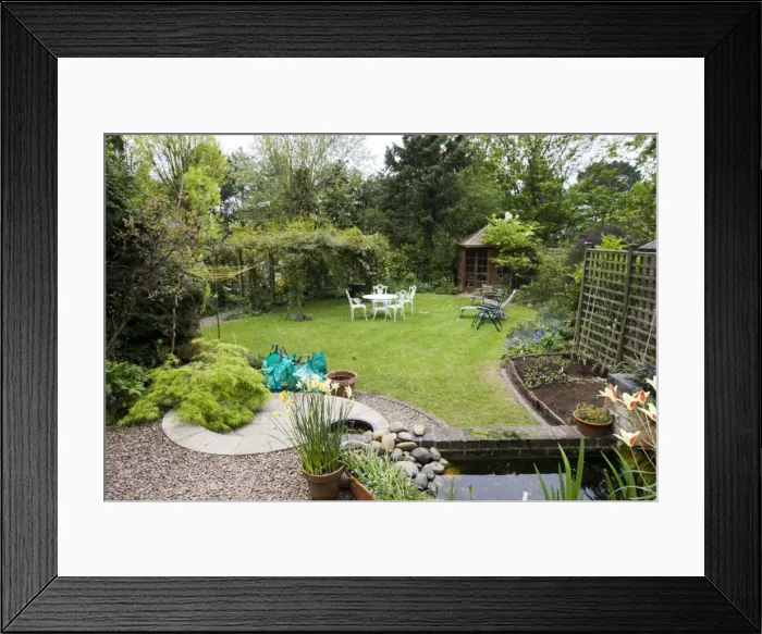Framed Print : Garden - attractive suburban back garden with pond. Cheltenham - UK Framed Print : Garden - attractive suburban back garden with pond. Cheltenham - UK