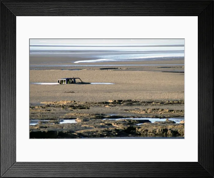 Framed Print : Morecombe Bay quicksands and tide engulf a Four wheel drive vehicle Framed Print : Morecombe Bay quicksands and tide engulf a Four wheel drive vehicle