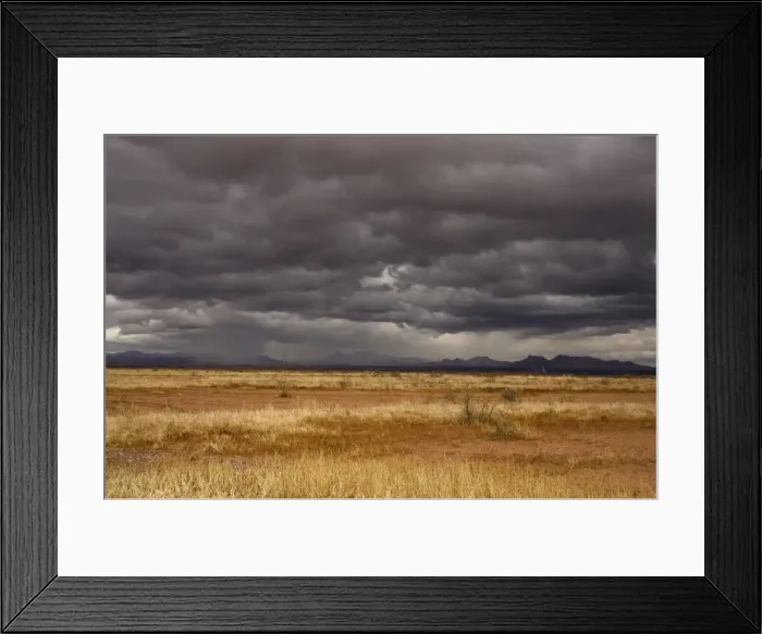 Framed Print : Grasslands and mountains near Douglas on the Arizona - Mexico border on a stormy winter evening, USA Framed Print : Grasslands and mountains near Douglas on the Arizona - Mexico border on a stormy winter evening, USA