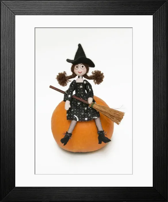 Framed Print : Witch - with broom sitting on a pumpkin Framed Print : Witch - with broom sitting on a pumpkin