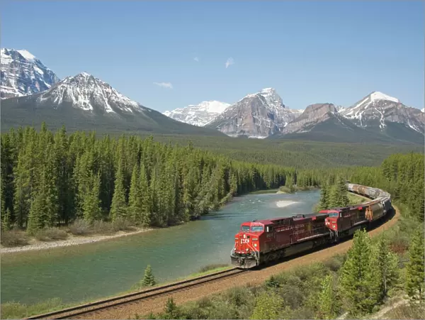 Morant's Curve - Canadian Pacific Railway with Bow range of mountains in the background - Banff National Park Alberta, Canada LA004247