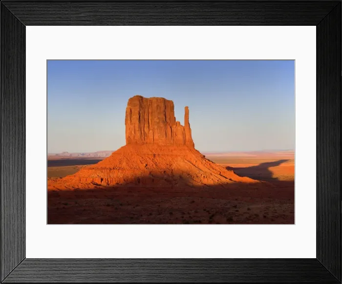 Framed Print : Monument Valley - famous sandstone butte West Mitten. In late evening light - Monument Valley Tribal Park, Navajo Reservation, Arizona, USA Framed Print : Monument Valley - famous sandstone butte West Mitten. In late evening light - Monument Valley Tribal Park, Navajo Reservation, Arizona, USA
