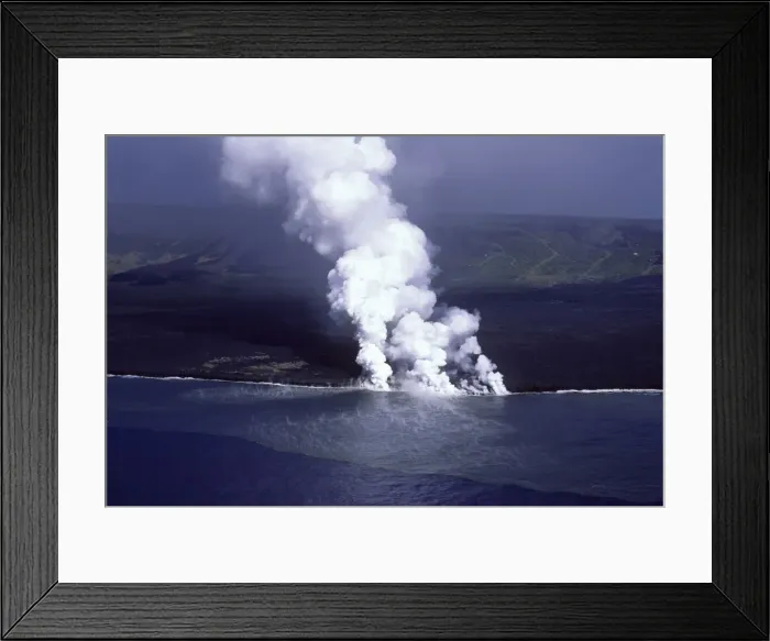 Framed Print : USA - Hawaii - Big Island - Eruption of the Pu'u O'o Vent - a vent of the Kilauea volcano - the lava flow reaches the Pacific Ocean - steam from boiling seawater reaches high into the sky Framed Print : USA - Hawaii - Big Island - Eruption of the Pu'u O'o Vent - a vent of the Kilauea volcano - the lava flow reaches the Pacific Ocean - steam from boiling seawater reaches high into the sky