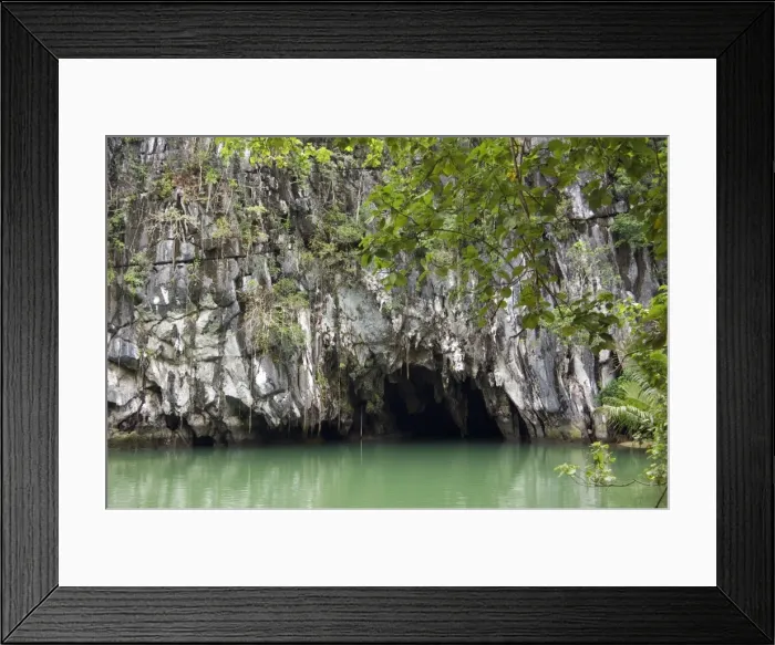 Framed Print : Entry to a cave that features a limestone karst mountain landscape with an 8. 2 km. navigable underground river - supposedly the longest navigable underground river in the world - a World Heritage Site in the the Puerto Princesa Subterranean River Framed Print : Entry to a cave that features a limestone karst mountain landscape with an 8. 2 km. navigable underground river - supposedly the longest navigable underground river in the world - a World Heritage Site in the the Puerto Princesa Subterranean River