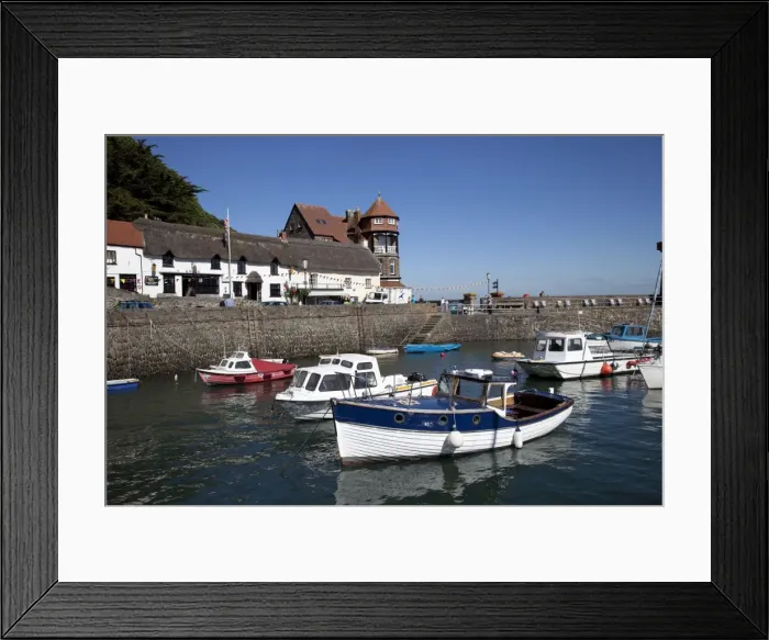 Framed Print : Small fishing boats in Lynmouth harbour with - Rhenish tower in background North Devon UK Framed Print : Small fishing boats in Lynmouth harbour with - Rhenish tower in background North Devon UK