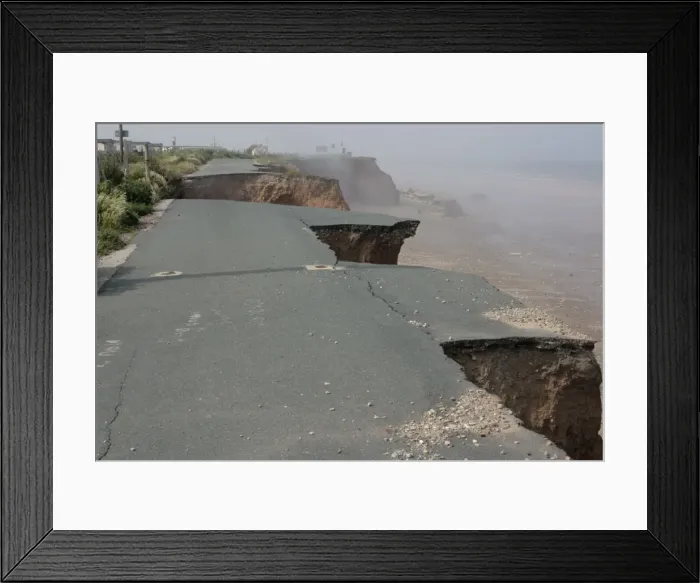 Framed Print : Collapsed tarmac road following cliff erosion on coast East Newton East Riding of Yorkshire UK Framed Print : Collapsed tarmac road following cliff erosion on coast East Newton East Riding of Yorkshire UK