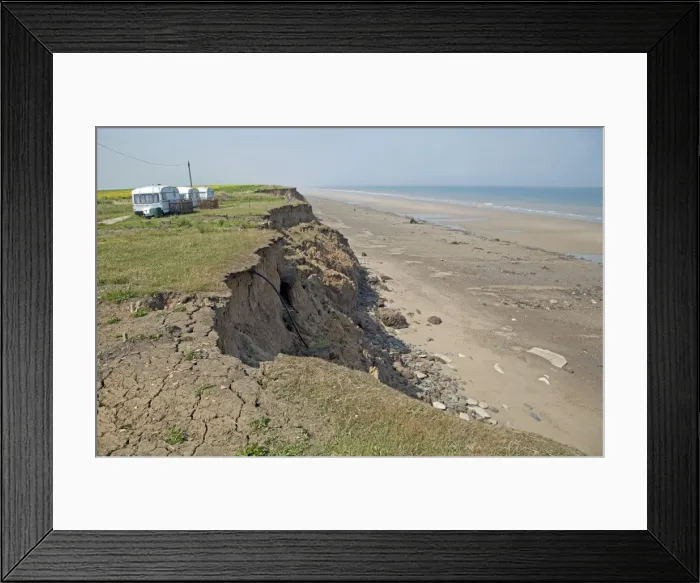 Framed Print : Collapsing tarmac road at cliff edge on coast road Skipsea East Riding of Yorskhire UK Framed Print : Collapsing tarmac road at cliff edge on coast road Skipsea East Riding of Yorskhire UK