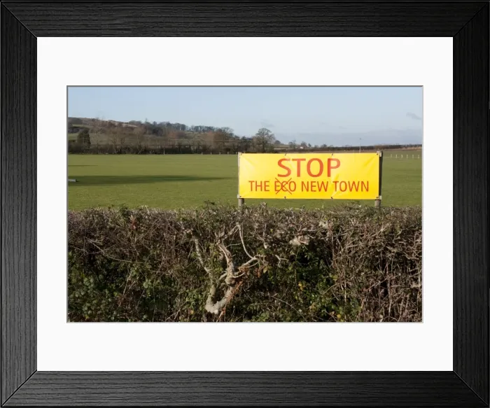 Framed Print : Stop the New Eco Town Campaign Banner - in field near Long Marston - Warwickshire - UK Framed Print : Stop the New Eco Town Campaign Banner - in field near Long Marston - Warwickshire - UK