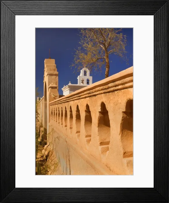 Framed Print : Mission San Xavier del Bac - beautiful archway, ornate wall and white bell tower of this famous mission in western style, near Tuscon - Tuscon, Arizona, USA Framed Print : Mission San Xavier del Bac - beautiful archway, ornate wall and white bell tower of this famous mission in western style, near Tuscon - Tuscon, Arizona, USA