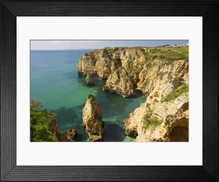 Framed Print : Eroding cliffs, stacks and islets at Ponta da Piedade, near Lagos, Algarve, Portugal Framed Print : Eroding cliffs, stacks and islets at Ponta da Piedade, near Lagos, Algarve, Portugal