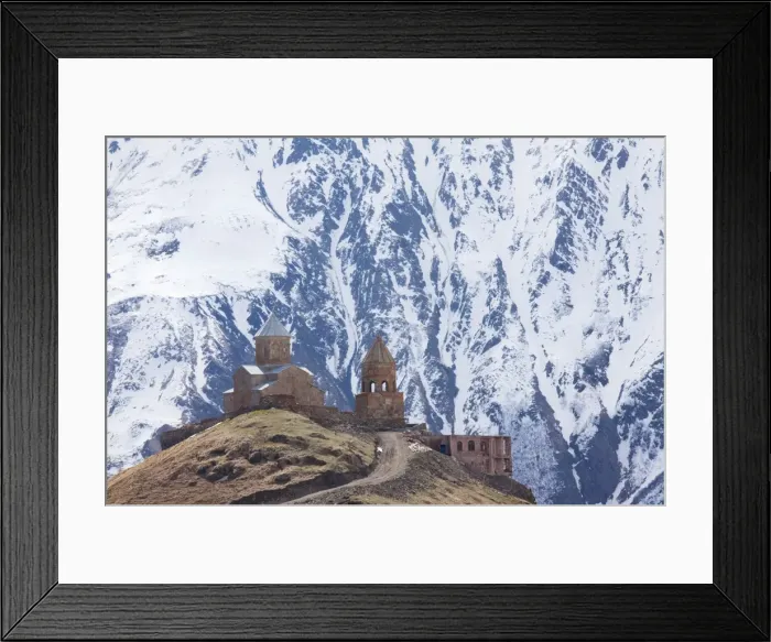 Framed Print : 14th century Gergeti Trinity Church (Georgian Orthodox) high in the mountains above Stepantsminda, Kazbegi in the Great Caucasus, Georgia Framed Print : 14th century Gergeti Trinity Church (Georgian Orthodox) high in the mountains above Stepantsminda, Kazbegi in the Great Caucasus, Georgia