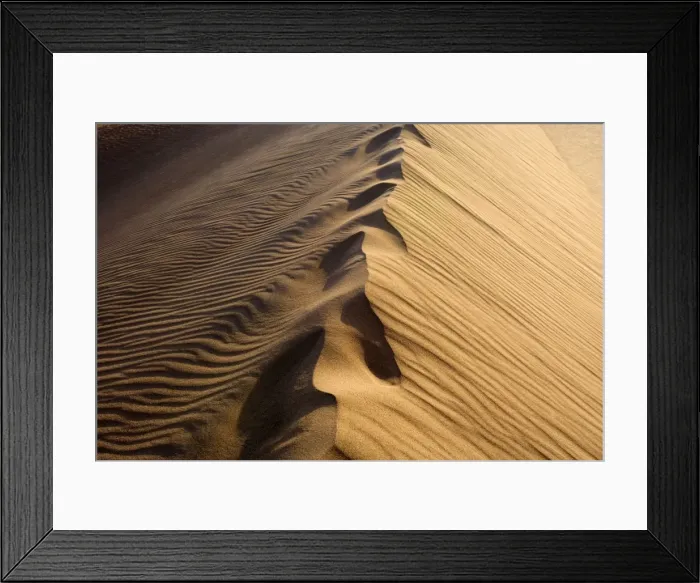 Framed Print : Mesquite Flat Sand Dune - obscured foot steps on the crest of a sand dune in early morning light. The dunes are made up of quartz and feldspar - Death Valley National Park, California, USA Framed Print : Mesquite Flat Sand Dune - obscured foot steps on the crest of a sand dune in early morning light. The dunes are made up of quartz and feldspar - Death Valley National Park, California, USA