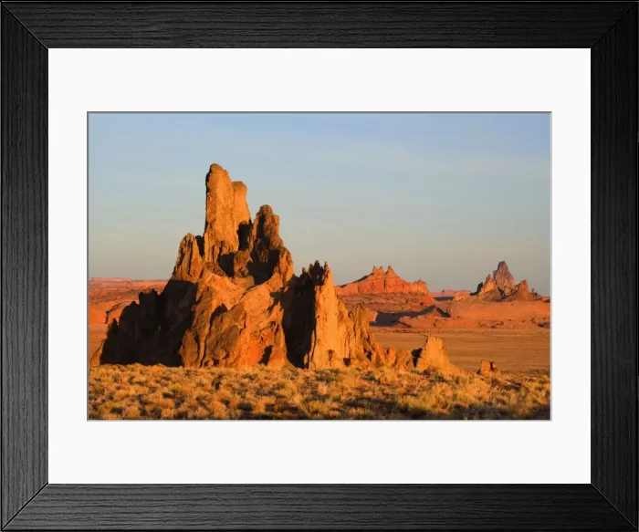 Framed Print : Church Rock - sandstone formation called Church Rock, Comb Ridge in the middle and Agathla Peak in the background in late evening light - Navajo Reservation near Kayenta, Arizona, USA Framed Print : Church Rock - sandstone formation called Church Rock, Comb Ridge in the middle and Agathla Peak in the background in late evening light - Navajo Reservation near Kayenta, Arizona, USA