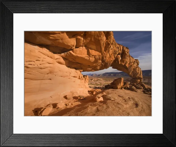 Framed Print : Sunset Arch - beautiful rock arch framing Navajo Mountain in the background. In the evening - Grand Staircase Escalante National Monument, Utah, USA Framed Print : Sunset Arch - beautiful rock arch framing Navajo Mountain in the background. In the evening - Grand Staircase Escalante National Monument, Utah, USA