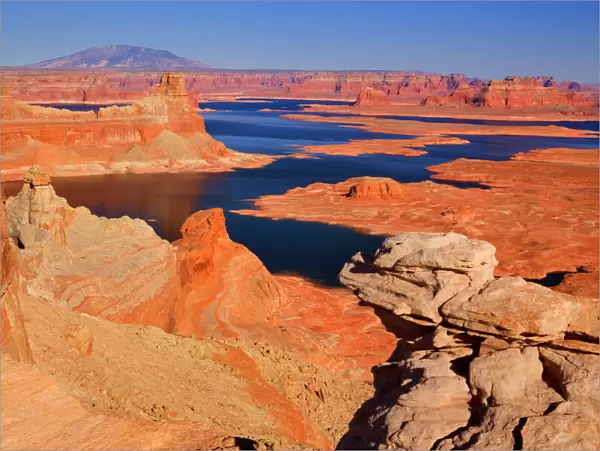 Lake Powell - panoramic view onto Lake Powell and canyons and buttes of red sandstone from Alstrom Point on the northern shore of the lake. The panorama encompasses Padre Bay, with Gunsight Butte in the foreground and Navajo Mountain