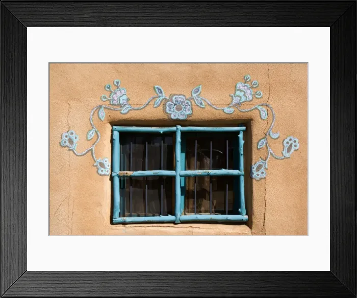 Framed Print : Ornate Window - turquoise painted window mounted in an adobe style building. It is decorated additionally by ornate paintings also in turqoise - Rancho de Taos, New Mexico, USA Framed Print : Ornate Window - turquoise painted window mounted in an adobe style building. It is decorated additionally by ornate paintings also in turqoise - Rancho de Taos, New Mexico, USA