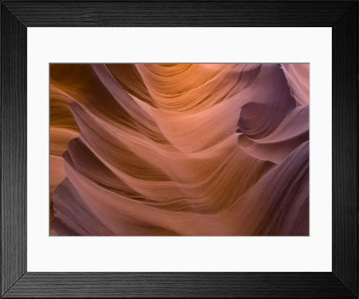 Framed Print : USA - Light that penetrates into the narrow canyon walls creates beautiful hues on the graceful curves of sandstone rock in the Lower Antelope Canyon, probably the most famous slot canyon in the Southwest. Antelope Canyon Framed Print : USA - Light that penetrates into the narrow canyon walls creates beautiful hues on the graceful curves of sandstone rock in the Lower Antelope Canyon, probably the most famous slot canyon in the Southwest. Antelope Canyon