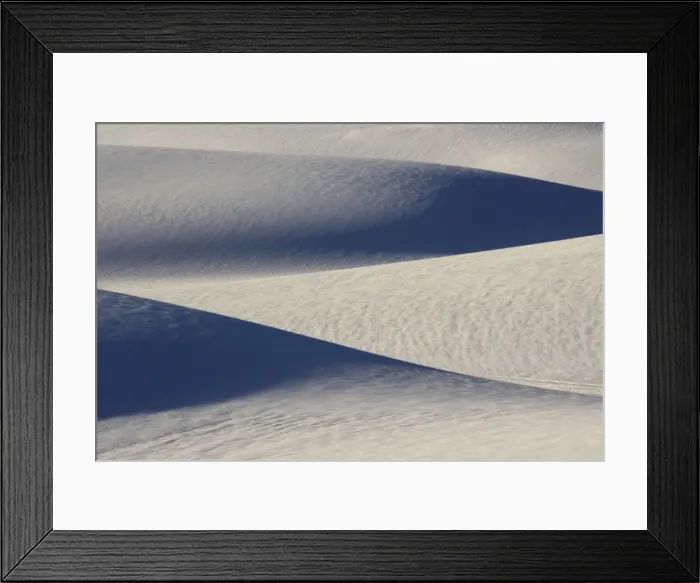Framed Print : USA - The glistening dunes of White Sands in the Tularosa Basin are not sand, but fine gypsum, deposited on an ancient seabed 250 million years ago. Gypsum, a form of calcium sulfate, is water soluble and washes away Framed Print : USA - The glistening dunes of White Sands in the Tularosa Basin are not sand, but fine gypsum, deposited on an ancient seabed 250 million years ago. Gypsum, a form of calcium sulfate, is water soluble and washes away