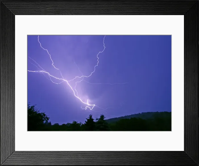 Framed Print : Lightning and thunder clouds-over woodland at night, Bramwald, Lower Saxony, Germany Framed Print : Lightning and thunder clouds-over woodland at night, Bramwald, Lower Saxony, Germany