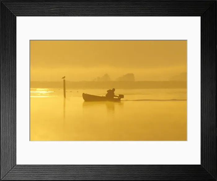 Framed Print : Fisherman in boat At dawn on Hickling Broad Norfolk UK Framed Print : Fisherman in boat At dawn on Hickling Broad Norfolk UK