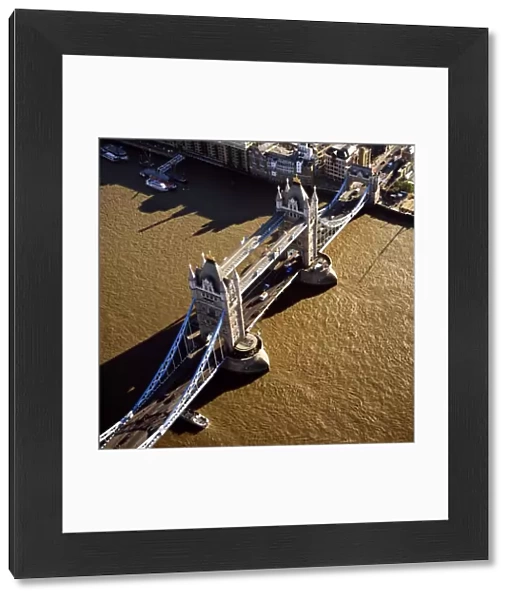 Aerial image of London, England, UK: Tower Bridge (a combined bascule and suspension bridge), over the River Thames