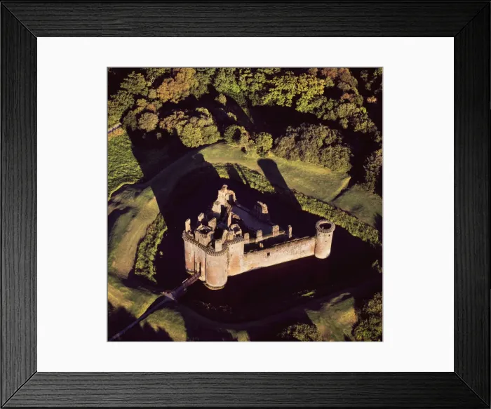 Framed Print : Aerial image of Scotland, UK: Caerlaverock Castle, a 13th-century triangular moated castle in the Caerlaverock National Nature Reserve area at the Solway Firth, Glencaple, Dumfries and Galloway Framed Print : Aerial image of Scotland, UK: Caerlaverock Castle, a 13th-century triangular moated castle in the Caerlaverock National Nature Reserve area at the Solway Firth, Glencaple, Dumfries and Galloway