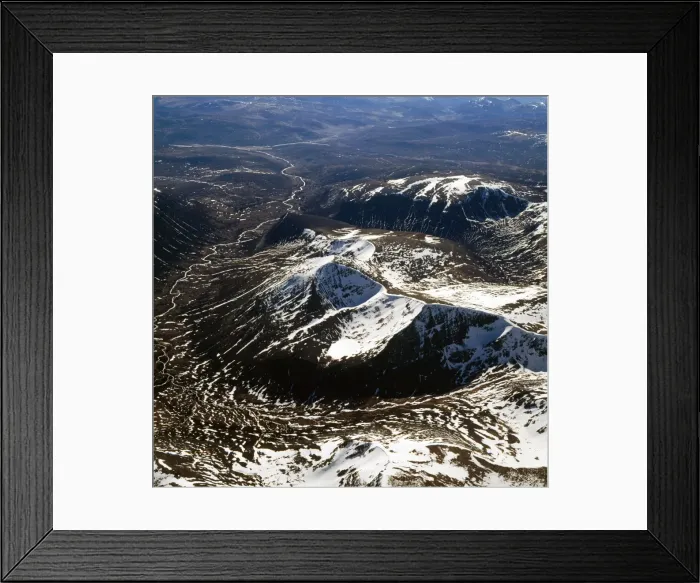 Framed Print : Aerial image of Scotland, UK: Cairn Toul (Hill of the barn) of The Cairngorms, the fourth highest mountain in Scotland, surpassed only by Ben Nevis, Ben Macdui and Braeriach. It towers above the western side pass of the Lairig Ghru Framed Print : Aerial image of Scotland, UK: Cairn Toul (Hill of the barn) of The Cairngorms, the fourth highest mountain in Scotland, surpassed only by Ben Nevis, Ben Macdui and Braeriach. It towers above the western side pass of the Lairig Ghru