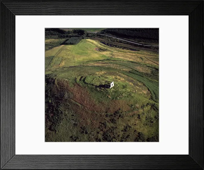 Framed Print : Aerial image of Scotland, UK: Dunnideer Castle, a 13th century tower house, built partially from the remains of an existing vitrified hill fort, Aberdeenshire, Scotland Framed Print : Aerial image of Scotland, UK: Dunnideer Castle, a 13th century tower house, built partially from the remains of an existing vitrified hill fort, Aberdeenshire, Scotland