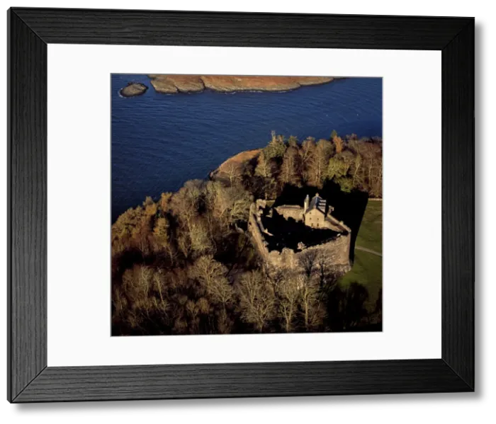Framed Print : Aerial image of Scotland, UK: Dunstaffnage Castle, a partially ruined 13th century castle, situated on a platform of conglomerate rock on a promontory at the south-west of the entrance to Loch Etive, surrounded on three sides by the sea, near Oban Framed Print : Aerial image of Scotland, UK: Dunstaffnage Castle, a partially ruined 13th century castle, situated on a platform of conglomerate rock on a promontory at the south-west of the entrance to Loch Etive, surrounded on three sides by the sea, near Oban