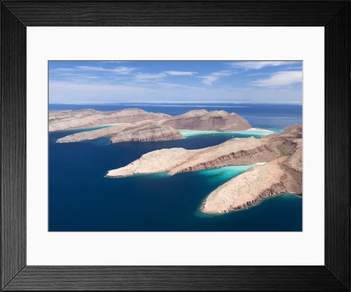 Framed Print : Baja California South, and Sea of Cortez, Mexico: Aerial view of two islands of the Bay of La Paz: Espiritu Santo and Partida, separated by a narrow channel Framed Print : Baja California South, and Sea of Cortez, Mexico: Aerial view of two islands of the Bay of La Paz: Espiritu Santo and Partida, separated by a narrow channel