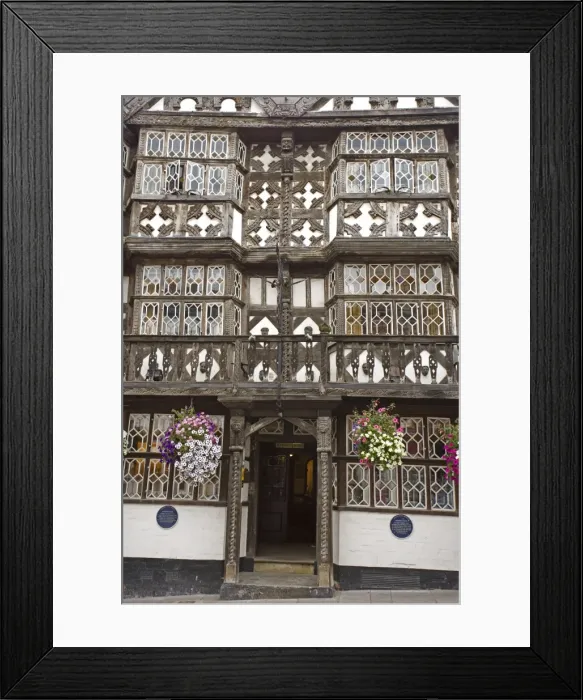 Framed Print : The Feathers Hotel - Ludlow - England - UK - in Shropshire - Became an inn in 1619 - Name comes from the motif of ostrich feathers forming part of the timber framed facade - Ostrich feathers are traditionally the badge of the Prince of Wales - Now a Framed Print : The Feathers Hotel - Ludlow - England - UK - in Shropshire - Became an inn in 1619 - Name comes from the motif of ostrich feathers forming part of the timber framed facade - Ostrich feathers are traditionally the badge of the Prince of Wales - Now a