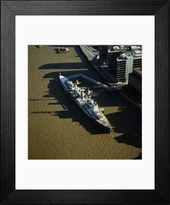 Framed Print : Aerial image of London, England, UK: HMS Belfast, a Royal Navy's Town-class cruiser, on the River Thames Framed Print : Aerial image of London, England, UK: HMS Belfast, a Royal Navy's Town-class cruiser, on the River Thames