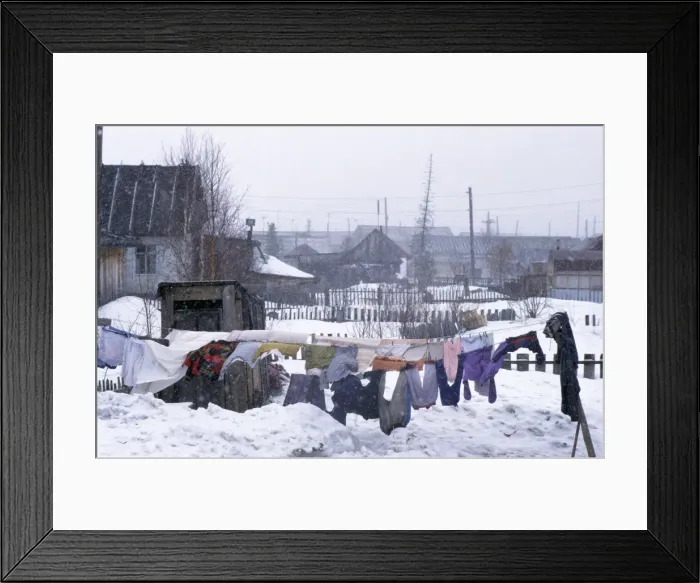 Framed Print : Clothes drying in snowfall, Siberia A typical scene in Krasnoselkup settlement, yards and houses covered in snow, clothes normally dryed outside all year round (in winter - longer); winter; North Tumen region, river Taz bank Framed Print : Clothes drying in snowfall, Siberia A typical scene in Krasnoselkup settlement, yards and houses covered in snow, clothes normally dryed outside all year round (in winter - longer); winter; North Tumen region, river Taz bank