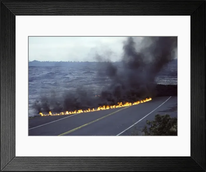 Framed Print : USA - Hawaii - Big Island - Eruption of the Pu'u O'o Vent - a vent of the Kilauea Volcano - Lava flow has cut the highway on the south side of the island - small flames Framed Print : USA - Hawaii - Big Island - Eruption of the Pu'u O'o Vent - a vent of the Kilauea Volcano - Lava flow has cut the highway on the south side of the island - small flames