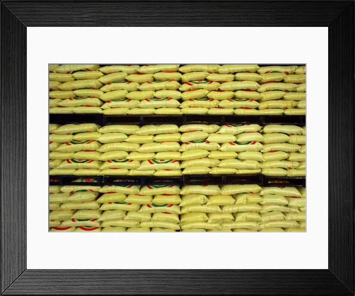 Framed Print : Sacks of rice stacked on shelves, ready for export Deniliquin, New South Wales, Australia JLR01548