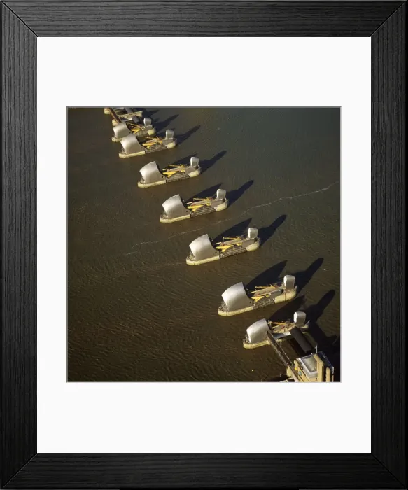 Framed Print : Aerial image of London, England, UK: The Thames Barrier, a flood control structure on the River Thames, Woolwich Reach Framed Print : Aerial image of London, England, UK: The Thames Barrier, a flood control structure on the River Thames, Woolwich Reach
