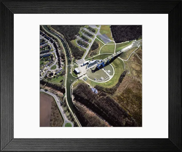 Framed Print : Aerial image of Scotland, UK: The Falkirk Wheel, Falkirk, Scotland, a rotating boat lift connecting the Forth and Clyde Canal with the Union Canal Framed Print : Aerial image of Scotland, UK: The Falkirk Wheel, Falkirk, Scotland, a rotating boat lift connecting the Forth and Clyde Canal with the Union Canal