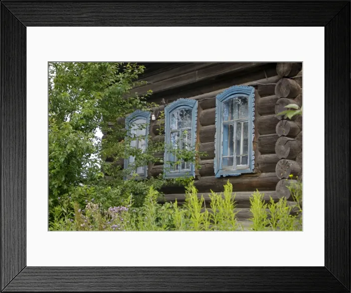 Framed Print : A traditional front of an early 19th century wooden house in village Karaul, which used to be a customs check-point settlement on a famous Babinov's road from European Russia to Siberia in 17-19th centuries; now desolated as well as Framed Print : A traditional front of an early 19th century wooden house in village Karaul, which used to be a customs check-point settlement on a famous Babinov's road from European Russia to Siberia in 17-19th centuries; now desolated as well as