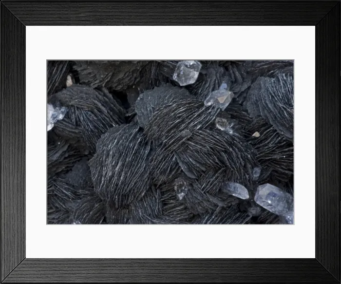 Framed Print : Hematite (Fe203) - China - Occurs as a hydrothermal and replacement mineral - Also forms in igneous rocks as an accessory mineral - Crystals are tabular or rhombohedral Framed Print : Hematite (Fe203) - China - Occurs as a hydrothermal and replacement mineral - Also forms in igneous rocks as an accessory mineral - Crystals are tabular or rhombohedral