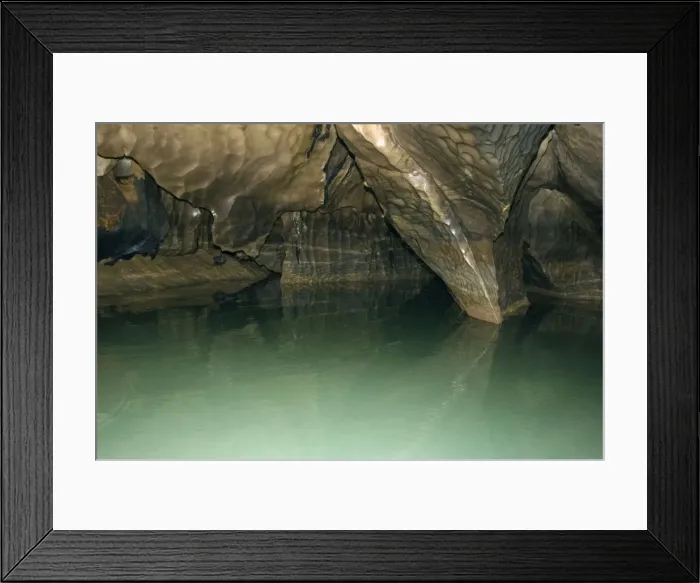 Framed Print : Limestone formations in the cave, that features a limestone karst mountain landscape with an 8. 2 km. navigable underground river, supposedly the longest navigable underground river in the world Framed Print : Limestone formations in the cave, that features a limestone karst mountain landscape with an 8. 2 km. navigable underground river, supposedly the longest navigable underground river in the world