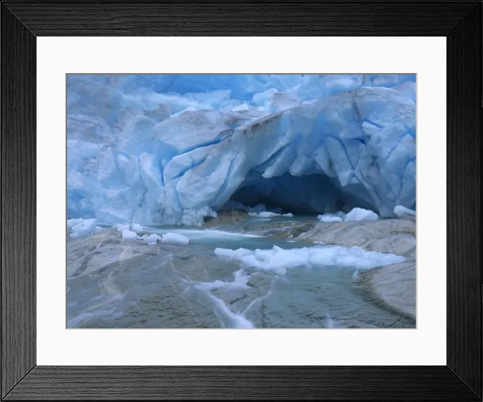 Framed Print : Glacier opening blue glacier ice and glacial river at Nigardsbreen glacier Jostedalsbreen National Park, Norway Framed Print : Glacier opening blue glacier ice and glacial river at Nigardsbreen glacier Jostedalsbreen National Park, Norway