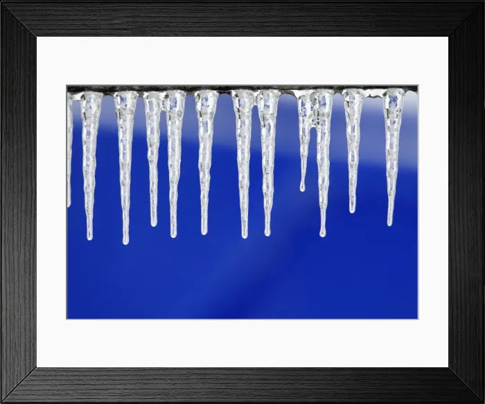 Framed Print : Icicles - hanging down from fence in winter - Lower Saxony - Germany Framed Print : Icicles - hanging down from fence in winter - Lower Saxony - Germany