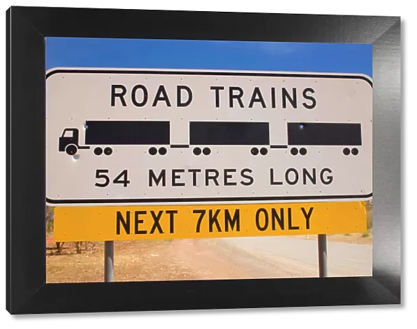 Roadtrain sign - a sign which warns of Roadtrains which can be up to 54 metres long. They must be passed very cautiously, because of their length - Western Australia, Australia